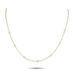 18K YELLOW GOLD 1.05CT DIAMOND STATION NECKLACE AN: A series of round-cut Diamonds with a total weight of 1.05 carats make this necklace sparkle every time it catches the light. The perfect piece for any occasion, its crafted from opulent 18K Yellow Go