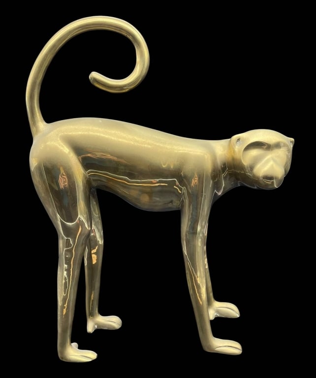DOLBI CASHIER 20TH C. DECO-STYLE BRASS MONKEY 22": Modern frosted glass monkey sculpture featuring a sleek minimalist form with elongated limbs and a dramatic curled tail. This stylized primate figure displays an elegant translucent finish with soft s