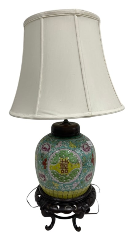 CHINESE FAMILLE ROSE PORCELAIN GINGER JAR LAMP 27": A decorative Chinese Famille Rose style porcelain ginger jar table lamp featuring a vibrant turquoise ground adorned with floral motifs, scrolling vine decoration, and a prominent Shuangxi (Double Hap