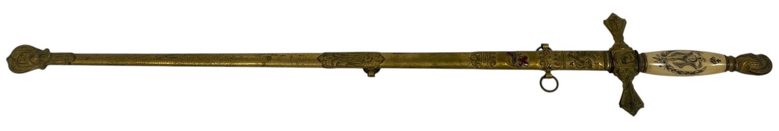 MASONIC CEREMONIAL SWORD WITH SCABBARD 36": Decorative Masonic ceremonial sword with ornate engraved metal scabbard and detailed hilt. The sword features a crossguard design, engraved fittings, and an ivory-tone grip decorated with Masonic symb