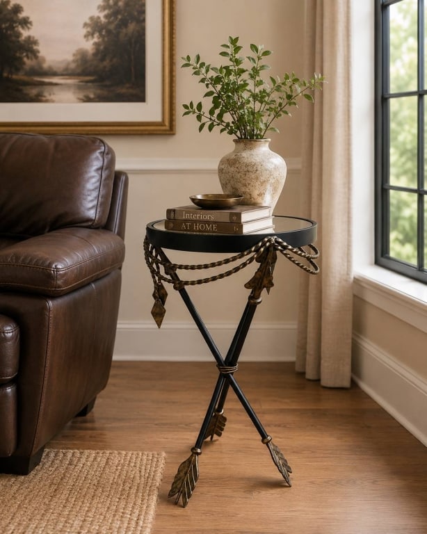 CONTEMPORARY IRON & GLASS ARROW SIDE TABLE 21": Side table has a round glass top with a decorative iron frame. The tripod base features unique arrow-shaped feet and twisted rope detailing. Suitable for eclectic or classic interiors, it combines fun