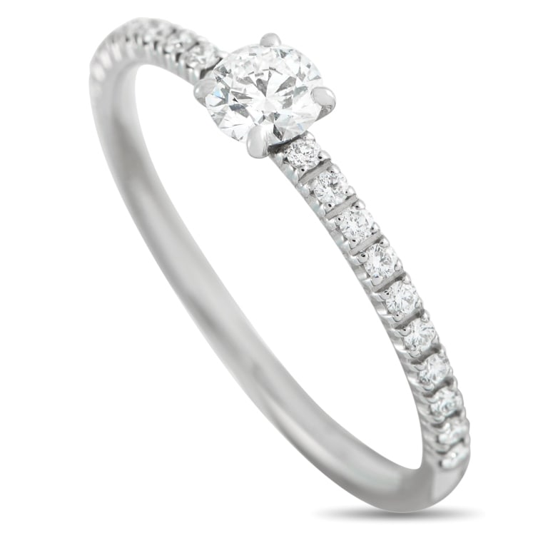 CARTIER ETINCELLE PLATINUM 0.21CT DIAMOND RING CA1: This Cartier Etincelle ring is an ideal piece for anyone who values feminine design and timeless simplicity. The simple Platinum setting seemingly radiates light thanks to the 0.21 carat GIA-Certified