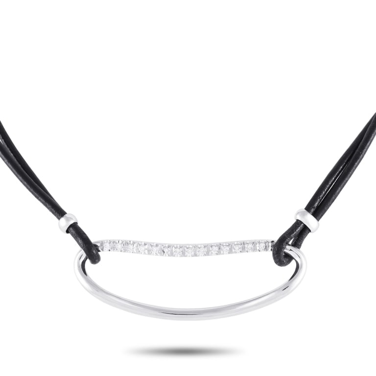 PIERO MILANO 18K WHITE GOLD 0.38CT DIAMOND CORD NE: A must-have for an edgy wardrobe. Don this black cord and diamond choker necklace and nail the rock-chic look. This Piero Milano necklace features a 14-inch black cord necklace holding a sculpted oval