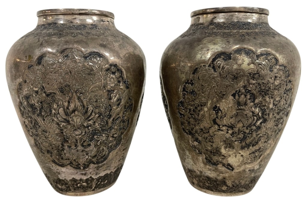 PAIR PERSIAN ISFAHAN 87.5% SILVER VASES 458 G: This attractive pair of Persian-style decorative vases features finely detailed repouss? floral and foliate ornamentation within shaped cartouches. The baluster-form bodies are embellished with densel
