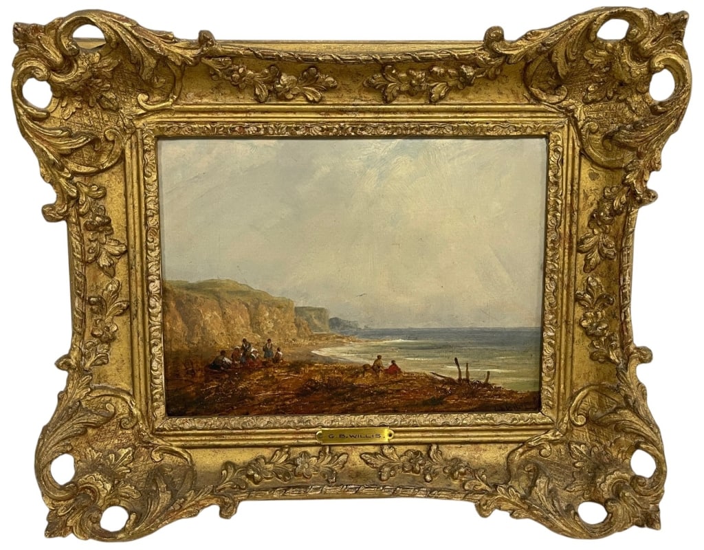 G.B. WILLIS COASTAL LANDSCAPE OIL PAINTING 17.5": This finely executed oil painting by G.B. Willis depicts a serene coastal scene with figures gathered along a shoreline beneath dramatic seaside cliffs. Rendered with an impressionistic touch, the com
