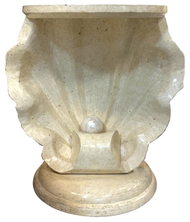 HOLLYWOOD REGENCY SEASHELL CONSOLE TABLE 30.5": Hollywood Regency-style decorative console featuring a large carved seashell form mounted on a round pedestal base. The piece is crafted from polished stone with a pearl-like sphere accent nestled wit