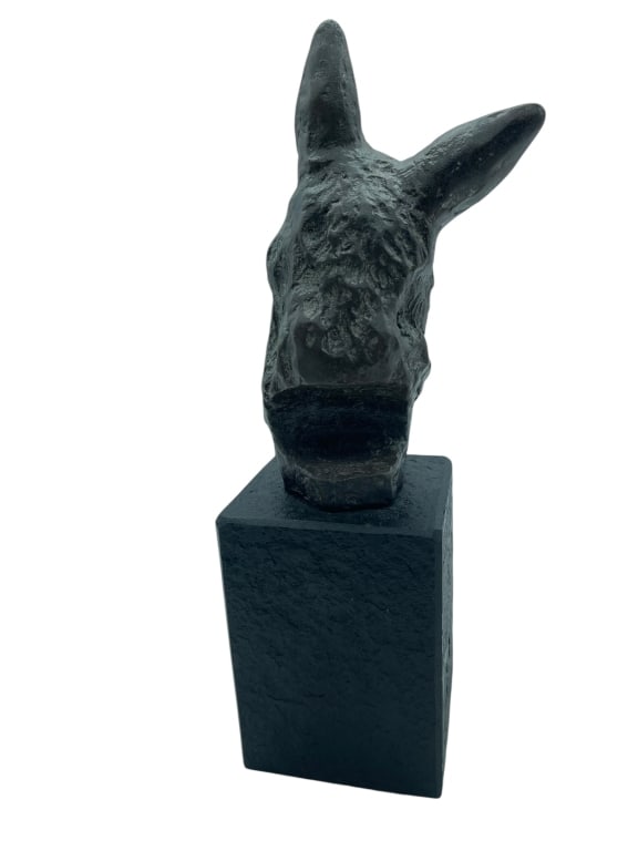 BRONZE DOG FIGURAL SCULPTURE 10": BRONZE DOG HEAD SCULPTURE ON PLINTH 10"-A finely modeled bronze sculpture depicting the head of a donkey mounted atop a rectangular plinth base. Rendered with expressive detail and a dark patinated fi