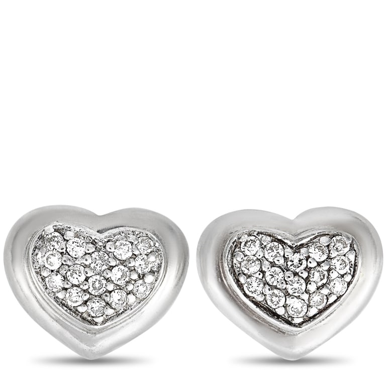 SCOTT KAY STERLING SILVER DIAMOND HEART STUD EARRI: These Scott Kay earrings are made out of sterling silver and diamonds that weigh 0.15 carats in total. The earrings measure 0.30 in length and 0.37 in width and each of the two weighs 1.8