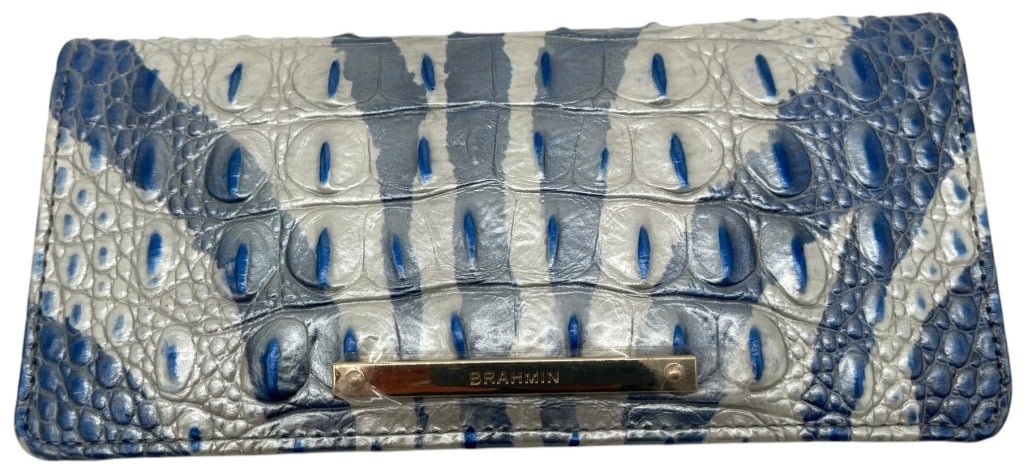 BRAHMIN BLUE CROC EMBOSSED WALLET 7.5": Brahmin embossed leather wallet featuring the brand?s signature crocodile-pattern texture in a striking blue, silver, and white color palette. The wallet is crafted from textured leather with a fold-o