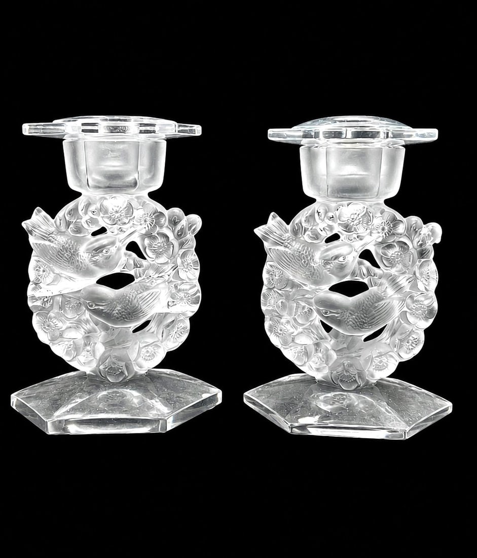 PAIR OF LALIQUE MESANGES CRYSTAL CANDLE HOLDERS 7": Elegant pair of Lalique Mesanges crystal candleholders, featuring the celebrated French crystal maker's signature motif of songbirds nestled among blossoming branches. Executed in frosted and clear cr