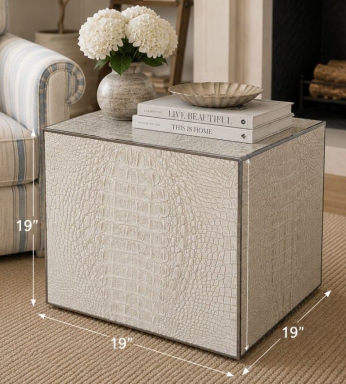 THEODORE ALEXANDER FAUX CROCODILE CUBE 19" x 19": Theodore Alexander cube-form accent table or ottoman clad in cream faux crocodile embossed leather with metal trim accents. The table features a square profile and textured surface designed to emulate
