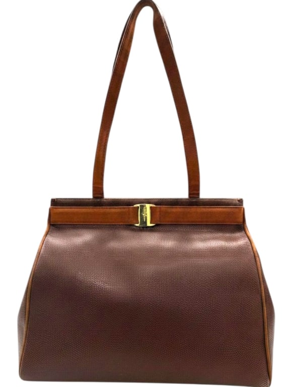 SALVATORE FERRAGAMO LIZARD LEATHER TOTE 13": Elegant vintage Salvatore Ferragamo tote crafted in rich brown lizard-embossed leather with signature grosgrain trim and the iconic gold-tone Gancini clasp. This timeless Italian design offers a struc