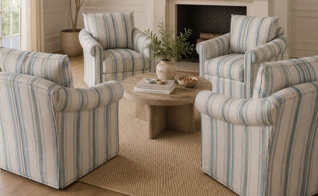VANGUARD STRIPED UPHOLSTERED ARMCHAIRS 4PC SET: Set of four upholstered armchairs by Vanguard Furniture, featuring blue, gray, and cream striped fabric upholstery. Each chair has rolled arms, loose back cushions, and cushioned seats designed for co