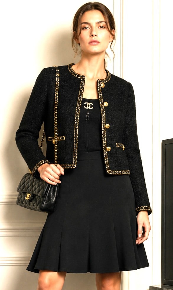 CHANEL BLACK CLASSIC SKIRT SZ 8: Elegant Chanel classic style black skirt featuring a graceful flared silhouette with paneled construction that creates soft movement and a feminine drape. Crafted in France, this timeless design offer