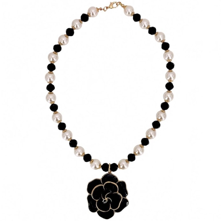 Coastal Camellia Flower Pearl Necklace: ?Name: Colette Necklace | ?Length: 22" + 3" Extender | ?Weight: 3 Ounces | ?Lightweight Black & Ivory Glass Pearl | ?Faceted Crystal Findings | ?Chunky Black Enamel Floral Flower Pendant | ?Vintage 14