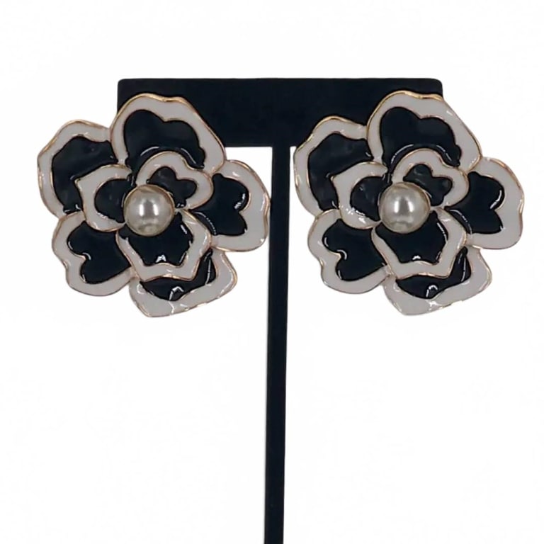 Black and White Floral Statement Earrings: Elegant enamel flower earrings with black and white petals and faux pearl centers. Fashion statement piece suitable for a variety of occasions. In good condition. | ?Name: Dahlia Earring | ?Length: 1.