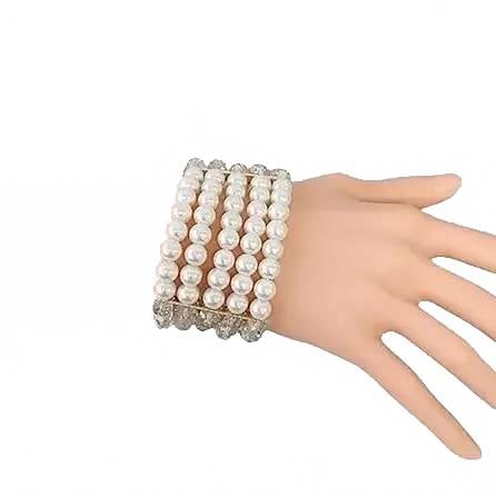 Chunky Coastal Crystal & Pearl Bracelet: Elegant wide bracelet featuring multiple rows of faux pearls and sparkly rhinestones, designed to create a statement look. Stretches for easy wear. Perfect for formal occasions or as a fashion accesso