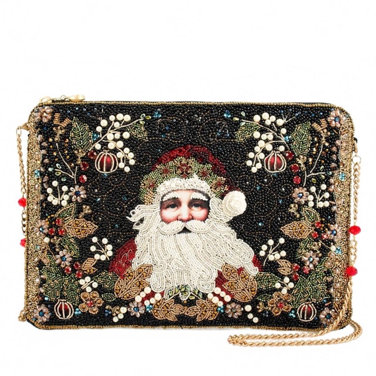 NEW MARY FRANCES HOLIDAY MAGIC NAG: Embrace the spirit of the season with Holiday Magic, a charming purse showcasing a vintage-inspired Santa surrounded by festive details. This elegant handbag brings a warm, nostalgic glow to your holi