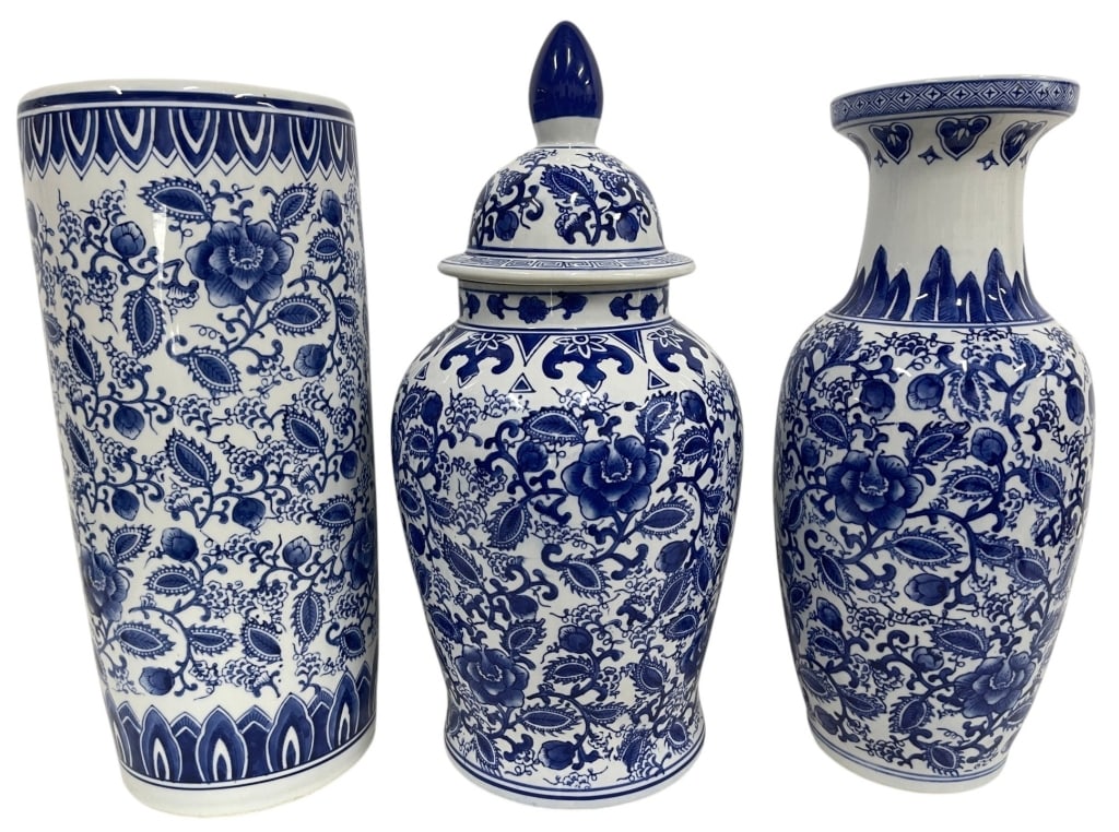 LOT OF 3 BLUE & WHITE CERAMIC VASES 18in: Lot of three blue and white ceramic decorative pieces including a tall cylindrical vase, a covered ginger jar, and a flared-neck baluster vase. Each features an allover floral and foliate pattern acce
