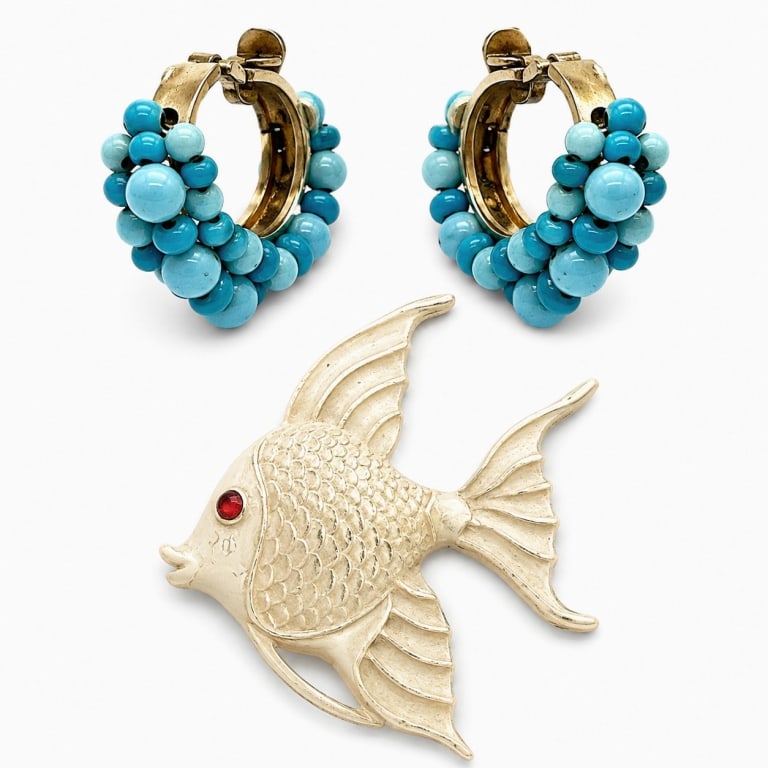 TRIFARI FISH PIN & HASKELL EARRINGS 2in: Vintage costume jewelry lot featuring a signed Trifari angelfish brooch dating to 1953 together with a pair of early earrings attributed to Miriam Haskell. The Trifari brooch is designed as a graceful