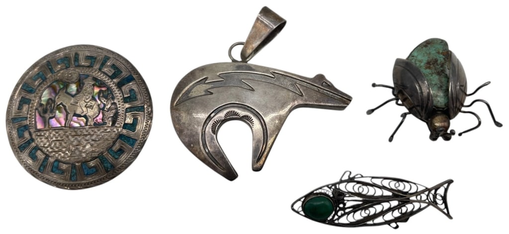 LOT OF 4 STERLING SILVER JEWELRY PCS 57.8G 2in: Lot of four silver jewelry pieces featuring Southwestern and artisan-inspired designs. The group includes a circular brooch or pendant with inlaid decorative accents and figural motif, a stylized bear