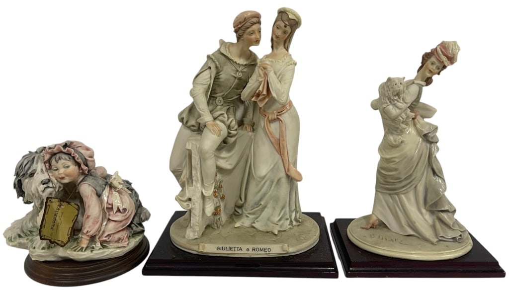 GIUSEPPE ARMANI FIGURINE 3 PC LOT 13in: Lot of three Giuseppe Armani figurines featuring elegant hand-painted porcelain sculptures mounted on wood bases. The collection includes a romantic "Giulietta e Romeo" scene, a graceful lady holding 