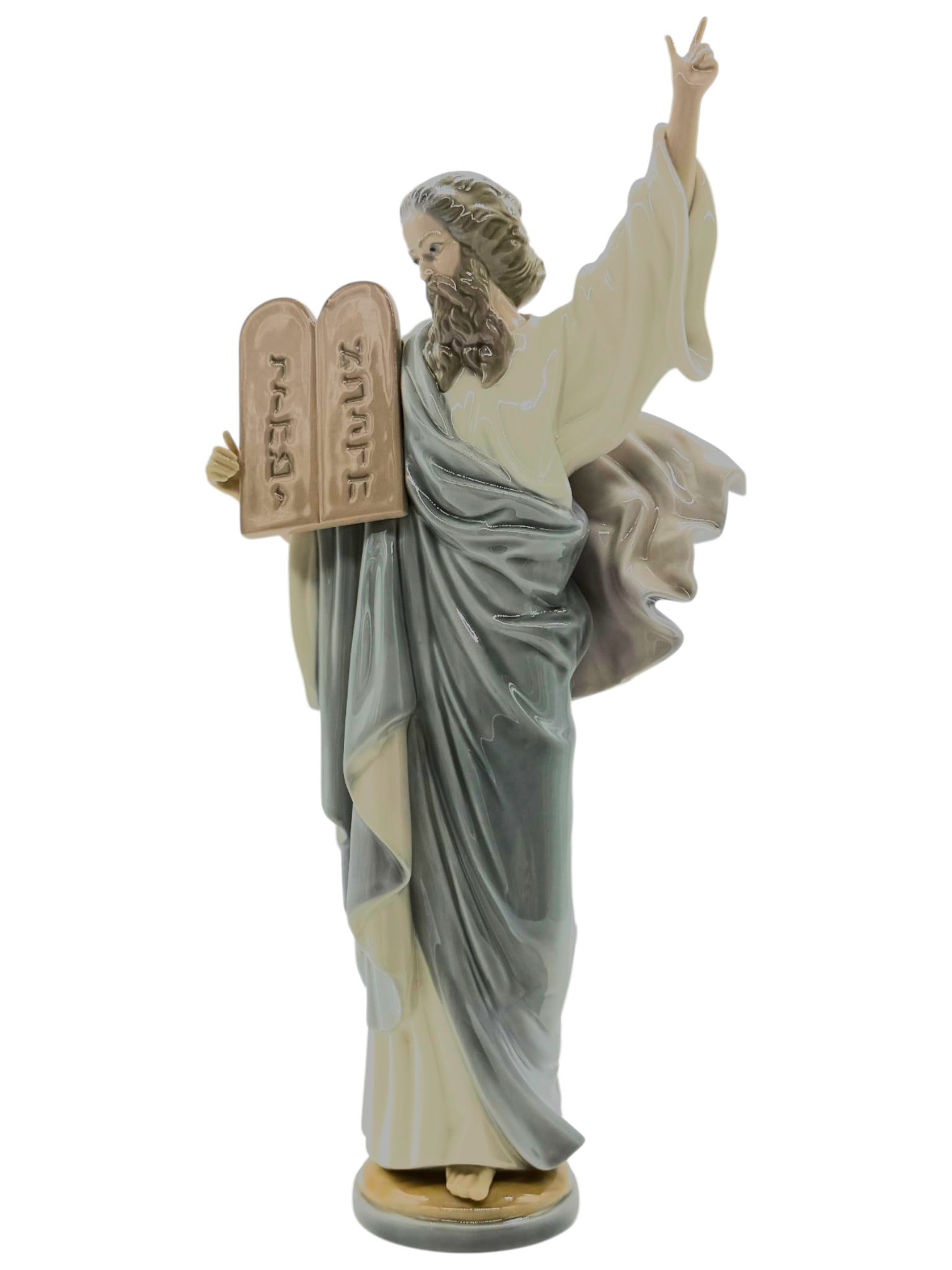 LLADRO MOSES TEN COMMANDMENTS FIGURE 14IN: This handcrafted Lladro porcelain figure depicts Moses holding the Ten Commandments, finished in the soft pastel palette and fine glazing for which the Spanish maker is renowned. Produced by Daisa in 
