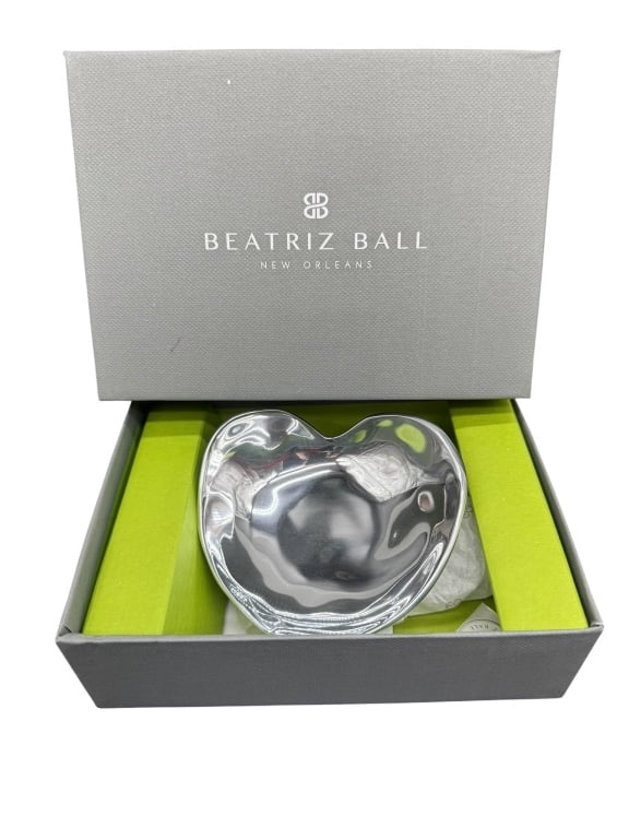 BEATRIZ BALL HEART SHAPED METAL BOWL: Beatriz Ball heart shaped metal bowl, presented in original box. Includes certificate of authenticity. Shipping Available at www.DeJaVuAuctionShipping.com By bidding in this auction you agree that you