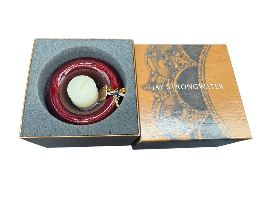 JAY STRONGWATER CANDLE HOLDER WITH BOX: Jay Strongwater candle holder with red glass and dragonfly embellishment. Includes original box and tag. Shipping Available at www.DeJaVuAuctionShipping.com. By bidding in this auction you agree that 