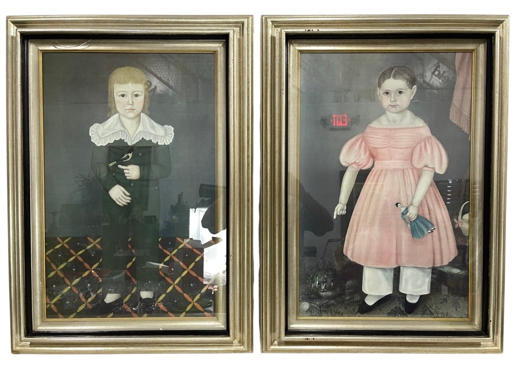 PAIR OF FOLK ART CHILD PORTRAITS 33": Charming pair of folk art-style child portraits depicting a young boy and girl in period attire. The boy is shown holding a bird, while the girl wears a pink dress and holds a small doll. Executed in 