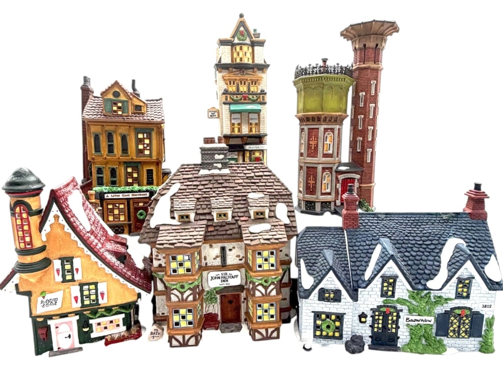 SIX LIGHTED CHRISTMAS VILLAGE HOUSES 11": Collection of six assorted illuminated Christmas village buildings and structures, including a whimsical "Snow Cone" cottage, Sir John Falstaff Inn, Brownlow Cottage, J. Lytes Coal Merchant building, 