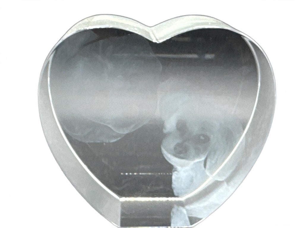 Heart-Shaped Crystal Paperweight with Dog Etching: Clear heart-shaped crystal paperweight featuring an etched image of a dog. Measures approximately 4.5 inches tall. Ideal as a decorative keepsake or gift for dog lovers. Excellent used condition with 