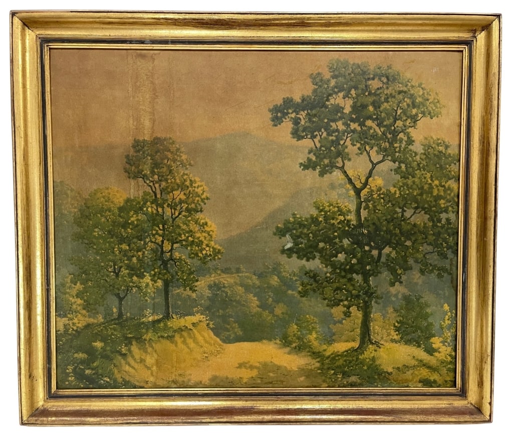 FRAMED LANDSCAPE PRINT GILT FRAME 34": Vintage landscape print depicting a sunlit woodland path with mature trees and distant rolling hills. The composition is rendered in warm earth tones and greens, creating a tranquil pastoral scene. Pr