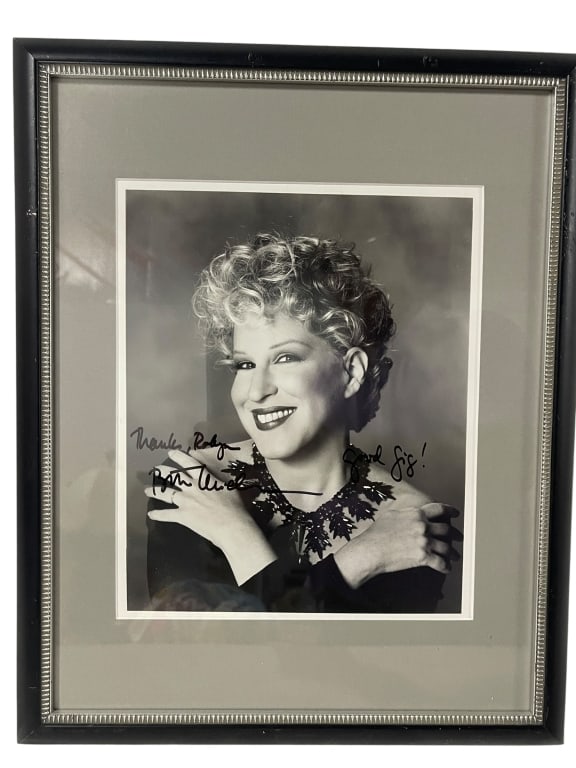 SINGER ACTRESS BETTE MIDLER SIGNED FRAMED PHOTO: This framed photograph features iconic singer and actress Bette Midler. The image is an original vintage 8x10 black-and-white promotional portrait, typically dating from the 1970s or 1980s. Bette Midl