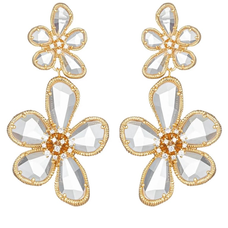 NEW EYE CANDY 18K GP CZ EARRINGS: Our Minoo Drop Earrings are a unique new touch to our classic Kolab Earrings. These cute drop earrings boast beautiful flower pendants that hang elegantly from similar miniature versions of themselves