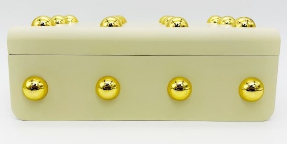 NEW!! CREAM LACQUER DECORATIVE BOX WITH GOLD STUDP: NEW!! CREAM LACQUER DECORATIVE BOX WITH GOLD STUD ACCENTS 4" HIGH X 12.5" WIDE X 9" DEEP-Elegant rectangular decorative box finished in soft cream lacquer and adorned with bold gold-tone dome stud acc