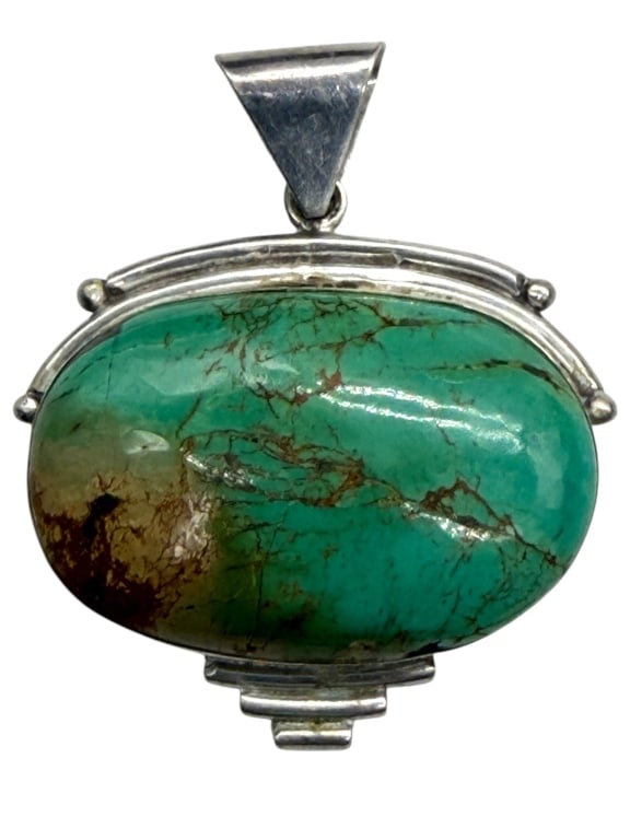 STERLING GREEN TURQOISE STONE PENDANT 2": Substantial sterling silver pendant featuring a polished oval green turquoise matrix cabochon in a handcrafted bezel setting with decorative border and large integrated bail marked "925." Its bold Sou