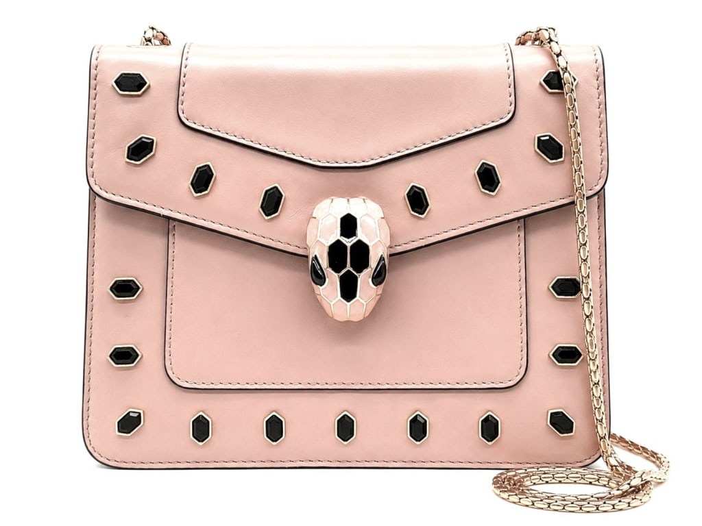 BVLGARI SERPENTI FOREVER BAG 8?: Elegant and instantly recognizable, this Bvlgari Serpenti Forever shoulder bag features soft blush pink leather accented with black gemstone-style embellishments and the iconic enamel Serpenti snake h