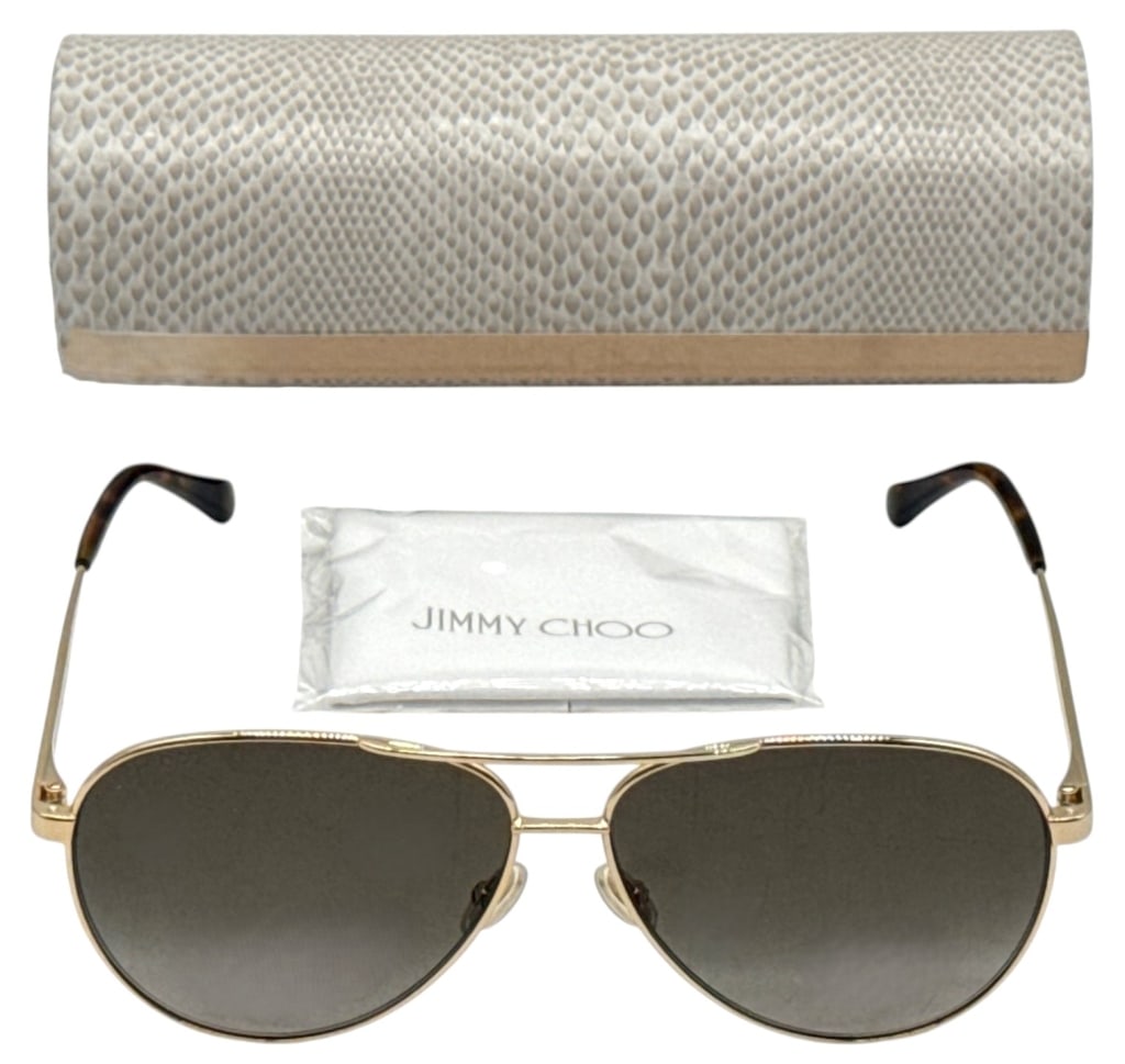 JIMMY CHOO JIMENA/S AVIATOR GOLD TONE SUNGLASSES: Jimmy Choo Jimena/S sunglasses featuring a gold-tone metal aviator frame with dark gradient lenses and tortoise-pattern temple tips. The temples include black crystal accents, and the frame is marked 
