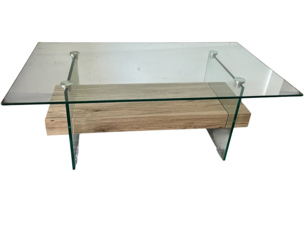 MODERN GLASS & WOOD COFFEE TABLE 43": Contemporary coffee table featuring a thick rectangular glass top supported by clear glass side panels and elevated above a floating wood veneer center shelf. The clean-lined design showcases minimali