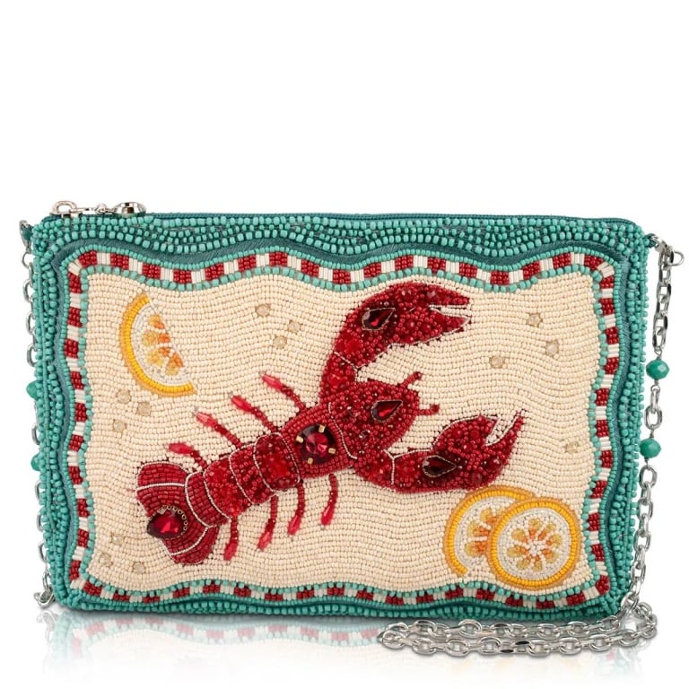 NEW MARY FRANCES CRACK ME UP BAG: This purse features a vibrant red lobster with lemon slices, accented by bold turquoise and red beadwork. Dimensions: 9.5 x 1.3 x 6.5 in (24.1 x 3.2 x 16.5 cm). Weight: 1 lb (453.59 g). Chain strap in