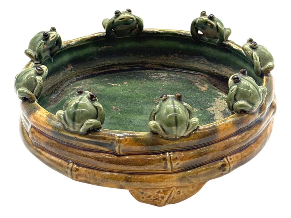 ANTIQUE ENGLISH MAJOLICA FROG PLANTER 8": This antique English Majolica planter features a charming circular design with eight hand-modeled frogs perched around the rim, each individually sculpted with expressive eyes and lifelike details. Fi
