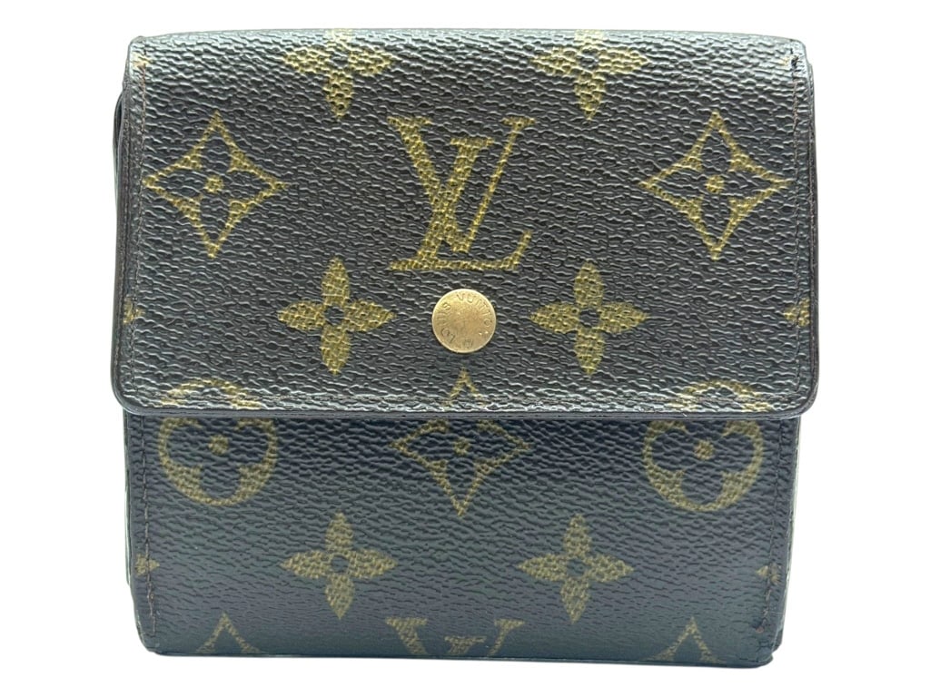 LOUIS VUITTON MONOGRAM ELISE WALLET 4.5": Crafted from Louis Vuitton's iconic Monogram coated canvas, this gently pre-owned Elise trifold wallet offers timeless style in a compact, functional design. Features the classic brown Monogram exteri