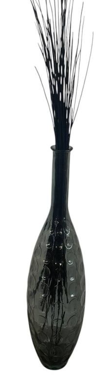 TALL SMOKED GLASS FLOOR VASE WITH REEDS 40": Tall smoked-gray glass floor vase featuring an elongated bottle form with a rounded body, narrow neck, and flared rim. The glass is decorated with an allover raised circular pattern that creates textu