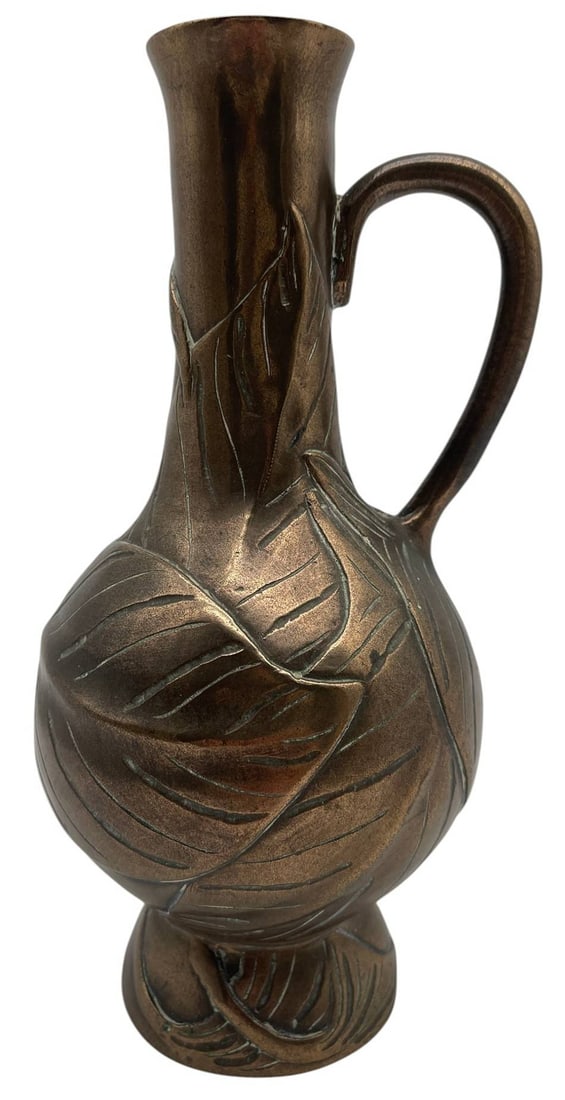 ART NOUVEAU STYLE BRONZE FINISH EWER 9": Decorative Art Nouveau style ewer featuring an elegant elongated neck, gracefully curved handle, and sculptural body adorned with flowing raised leaf motifs. Finished in a rich bronze-tone patina, the