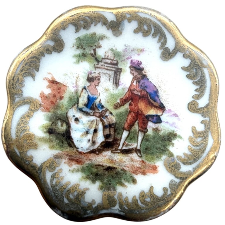 LIMOGES FRANCE MINIATURE PLATE 1.5": This exquisite miniature Limoges, France porcelain plate features a romantic hand-painted courting scene surrounded by an ornate raised gilt scroll border. The scalloped edge and delicate polychrome d