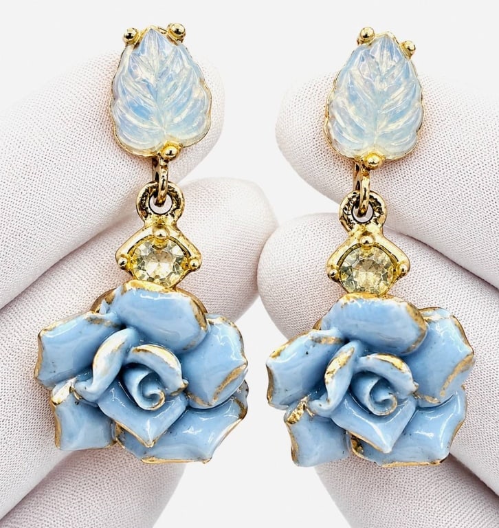 VINTAGE BLUE ROSE DANGLE EARRINGS 1 1/2": Beautiful pair of vintage gold-tone screwback dangle earrings featuring delicately sculpted light blue glass roses accented with hand-applied gold highlights. Each floral drop is suspended beneath a f