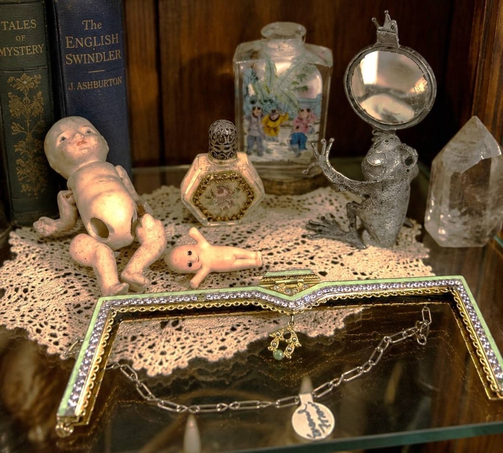 VINTAGE CURIO CABINET ASSORTMENT LOT 7": This eclectic vintage curio lot features a charming assortment of decorative and collectible pieces perfect for display or repurposing. Included are an ornate Art Deco style jeweled purse frame with c