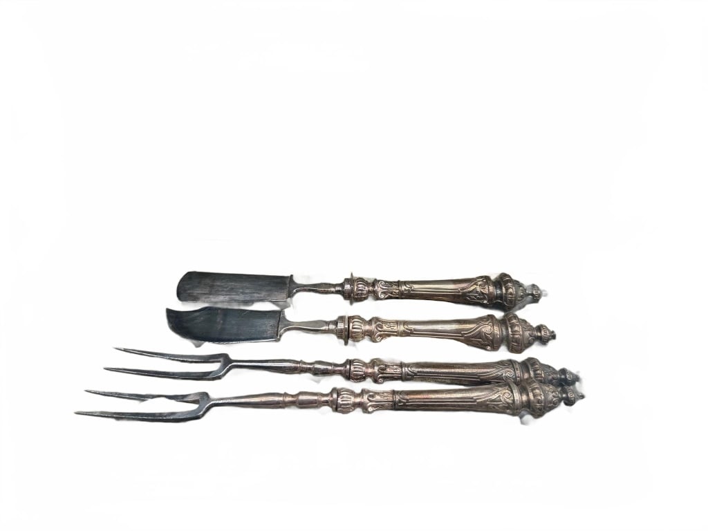 Joseph Goemans Silver Plated Carving Set: Silver plated carving set by Joseph Goemans, Antwerp, comprising a meat fork, a carving fork, and a carving knife with ornate handles in fitted silk-lined case. Manufacturer's details on the interior 