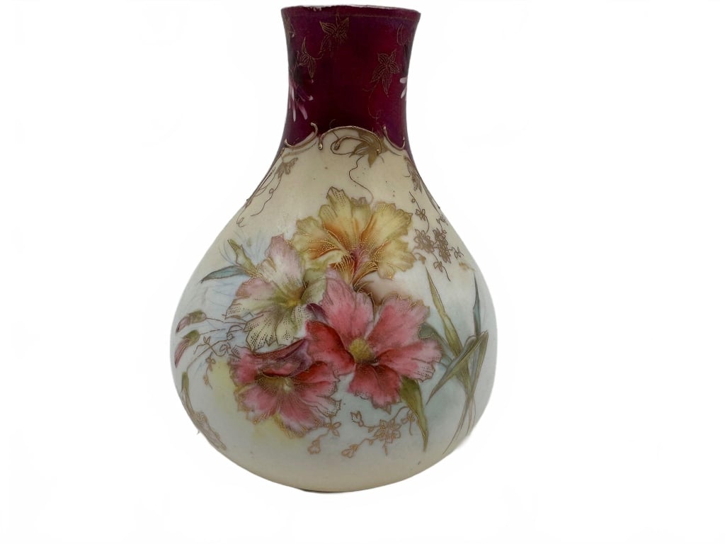Hand-Painted Porcelain Vase with Floral Motif: Porcelain vase with bulbous body and narrow neck. Features hand-painted floral designs, including yellow and pink flowers, with gold accents on a burgundy and cream background. No visible maker's mark